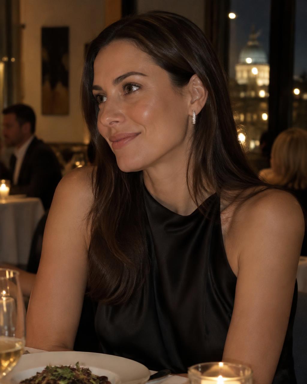 Woman wearing huggie hoops at dinner